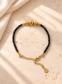 Bransoletka Essentia Black and gold –  czarny turmalin